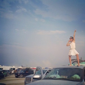 carrot turned microphone on the roof of our car during Burning Man exodus