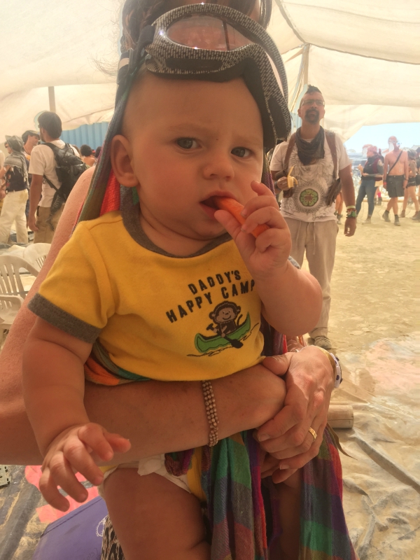 one of my favorite Burning Man moments...Joe and I went to meet this adorable little guy and he stole Joe's organic carrot right out of his hand. 